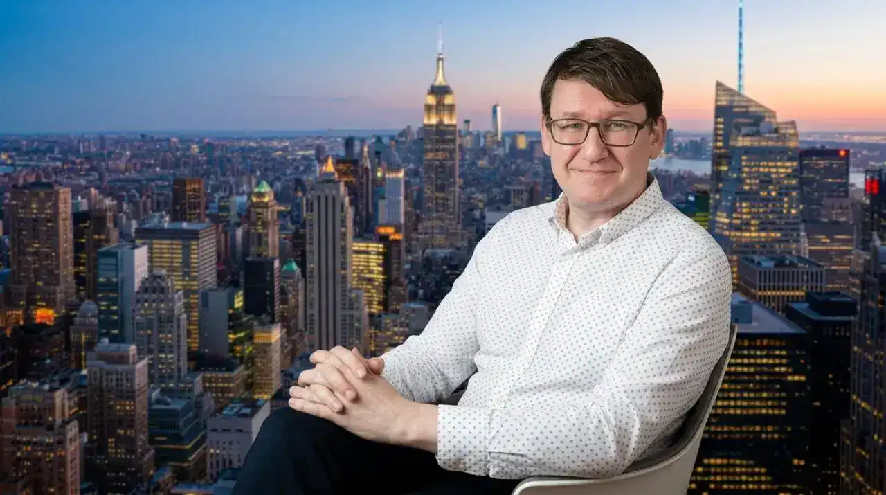 Dr. Kennedy with Manhattan skyline